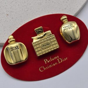 Vintage piny Dior – zestaw 3 szt., złoto, sygnowane, lata 90.