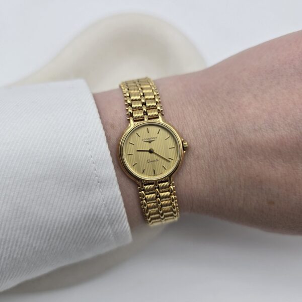 LONGINES - złoty zegarek vintage na bransolecie na ręce