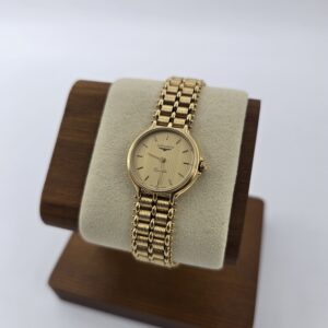 LONGINES - złoty zegarek vintage na bransolecie od boku