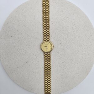 LONGINES - złoty zegarek vintage na bransolecie widok od góry