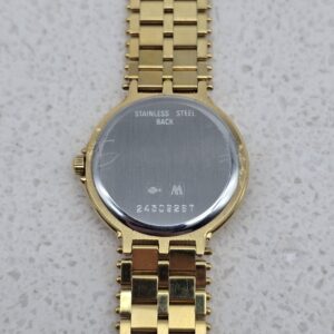 LONGINES - złoty zegarek vintage na bransolecie zbliżenie na tył