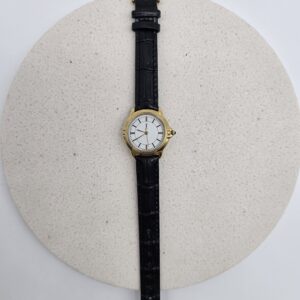 YVES SAINT LAURENT - złoty zegarek vintage na czarnym pasku widok od góry