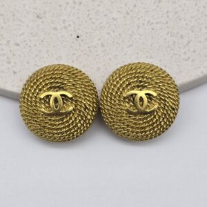 CHANEL - złote okrągłe klipsy vintage z logowaniem, lata 90.