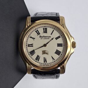 BURBERRY - zegarek vintage, okrągła koperta, czarny pasek, rymskie indeksy