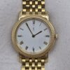 YVES SAINT LAURENT - złoty zegarek vintage na bransolecie