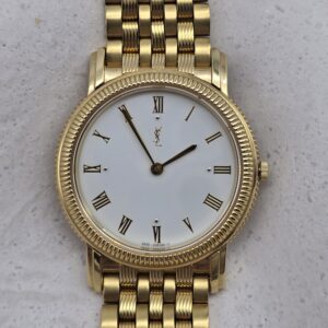 YVES SAINT LAURENT - złoty zegarek vintage na bransolecie
