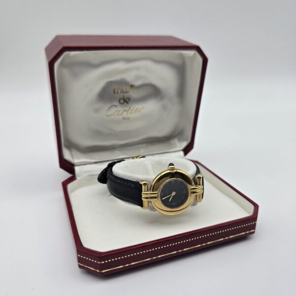 CARTIER - złoty zegarek vintage z ciemną tarczą w pudełku