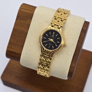 GIVENCHY - złoty zegarek vintage na bransolecie na ekspozytorze