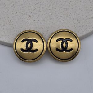 CHANEL - okrągłe klipsy vintage z logowaniem
