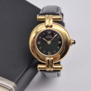 CARTIER - złoty zegarek vintage z ciemną tarczą