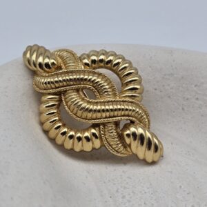 CHRISTIAN DIOR - złota broszka vintage „węzeł”