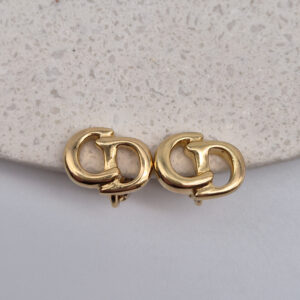 CHRISTIAN DIOR - minimalistyczne złote klipsy vintage z monogramem CD