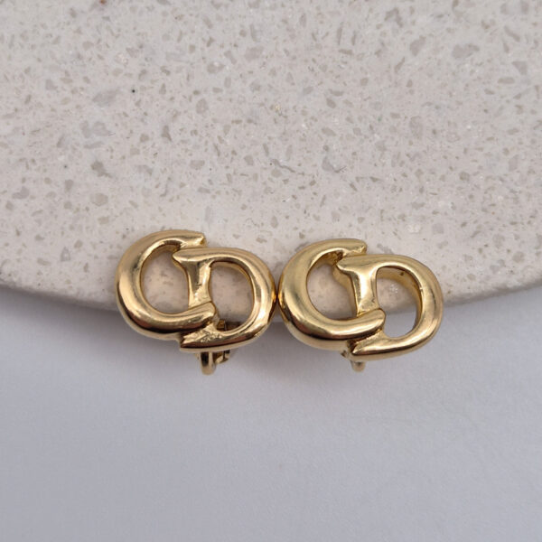 CHRISTIAN DIOR - minimalistyczne złote klipsy vintage z monogramem CD
