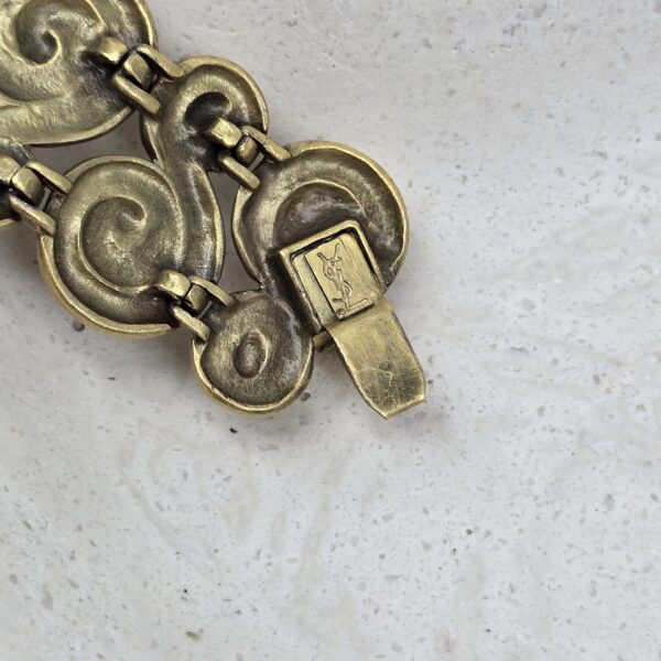 YSL - duża złota rzeźbiona bransoletka vintage zbliżenie na zapięcie