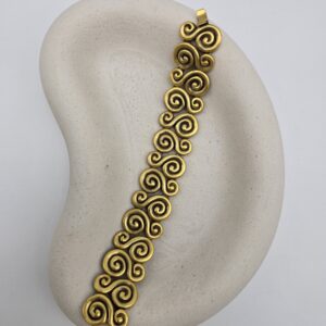 YSL - duża złota rzeźbiona bransoletka vintage widok na przód