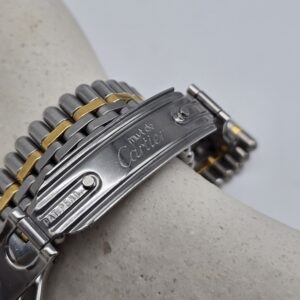 MUST DE CARTIER 21 - srebrno-złoty zegarek vintage na bransolecie zbliżenie na sygnaturę