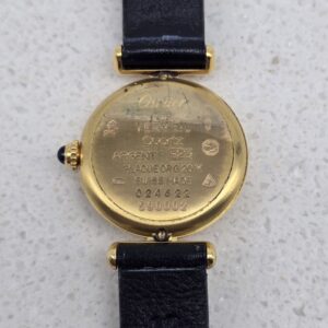 CARTIER - złoty delikatny zegarek vintage zbliżenie na tył