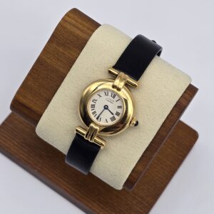 CARTIER - złoty delikatny zegarek vintage na ekspozytorze