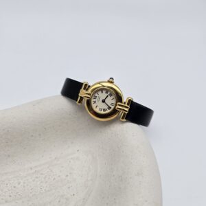 CARTIER - złoty delikatny zegarek vintage z boku