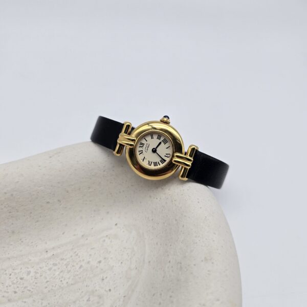 CARTIER - złoty delikatny zegarek vintage z boku