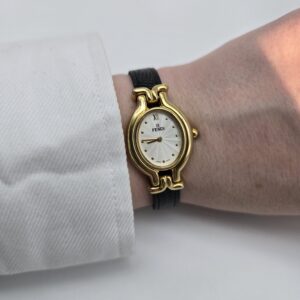 FENDI 640L - owalny złoty zegarek vintage na ręce