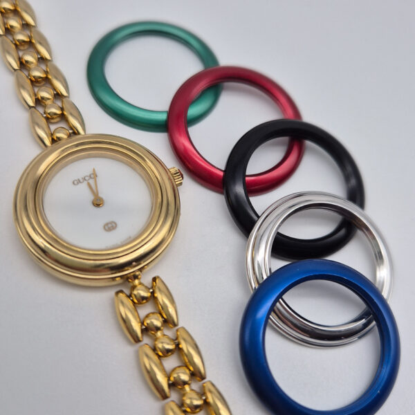 GUCCI - złoty zegarek vintage z wymiennymi bezelami lata 90.