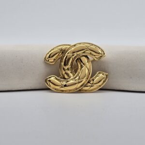 CHANEL - złota broszka vintage CC