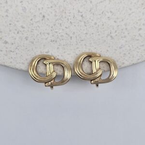 CHRISTIAN DIOR - delikatne złote klipsy z monogramem CD