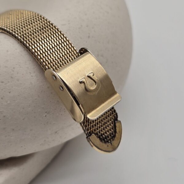 OMEGA - złoty zegarek mechaniczny vintage detal