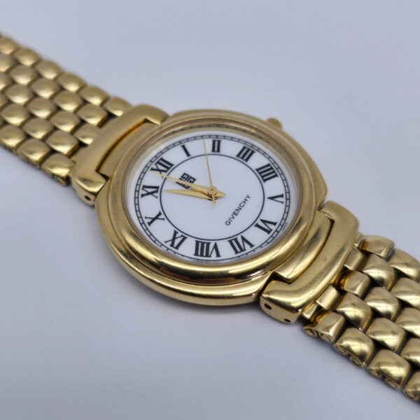 GIVENCHY - złoty zegarek vintage na bransolecie zbliżenie przód
