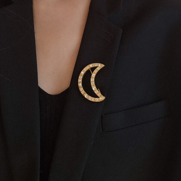 YSL - broszka vintage z motywem księżyca na sylwetce