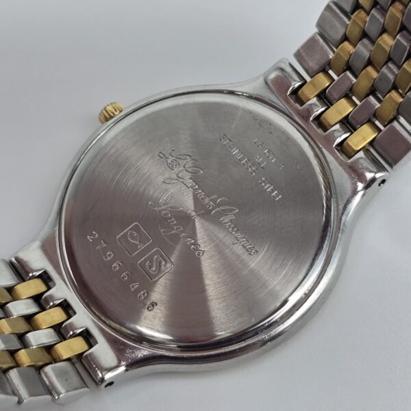 LONGINES - klasyczny zegarek vintage z rzymskimi indeksami zbliżenie dekla