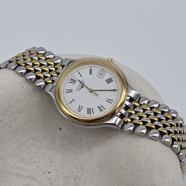 LONGINES - klasyczny zegarek vintage z rzymskimi indeksami artystyczne