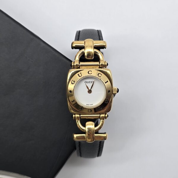 GUCCI - pozłacany zegarek vintage na czarnym pasku