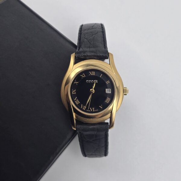 GUCCI - złoty zegarek vintage z czarną tarcząv