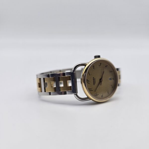 HERMÈS - zegarek vintage na złoto-srebrnej bransolecie na boku