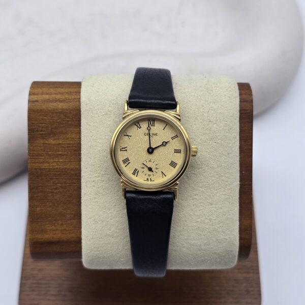 CELINE – minimalistyczny złocony zegarek vintage z drobinkową tarczą front