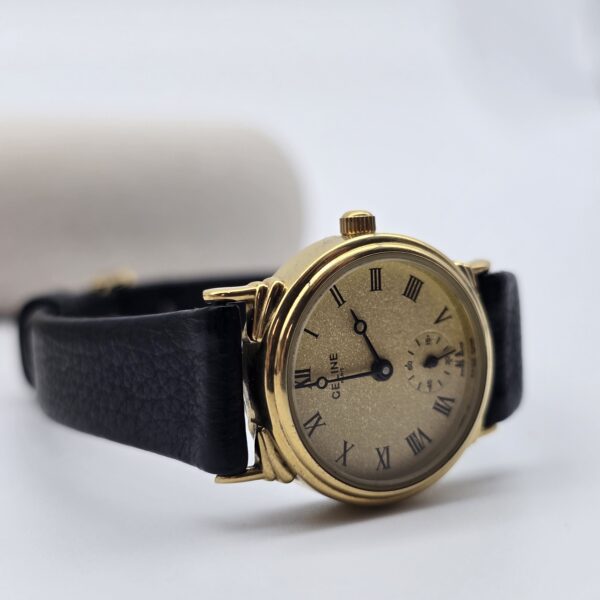 CELINE – minimalistyczny złocony zegarek vintage z drobinkową tarczą bok