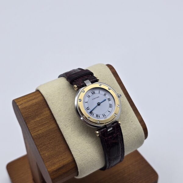 CARTIER - elegancki zegarek vintage, Santos Ronde, lata 90. na stojaku