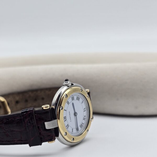 CARTIER - elegancki zegarek vintage, Santos Ronde, lata 90. przy podstawce