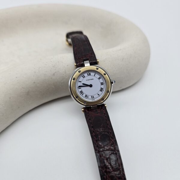 CARTIER - elegancki zegarek vintage, Santos Ronde, lata 90. na podstawce