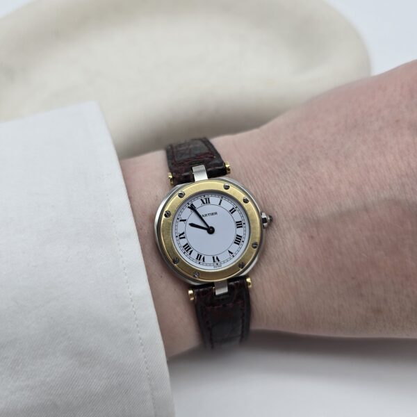 CARTIER - elegancki zegarek vintage, Santos Ronde, lata 90. na ręku