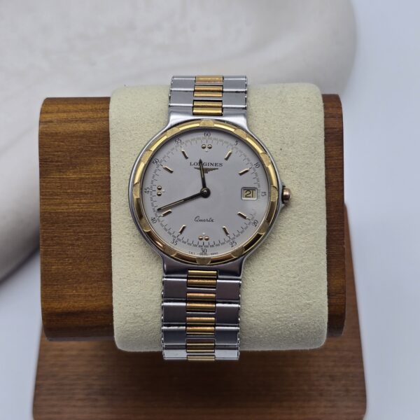 LONGINES - elegancki zegarek vintage, bikolor na stojaku