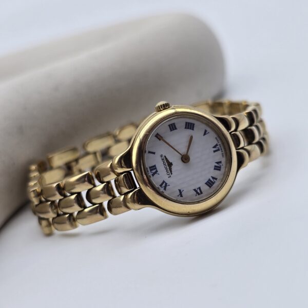 LONGINES - minimalistyczny zegarek vintage na bransolecie z rzymskimi indeksami, lata 90. front