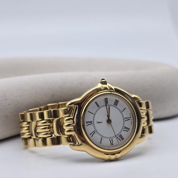 YSL – złoty zegarek vintage na bransolecie z rzymskimi indeksami, lata 90. front