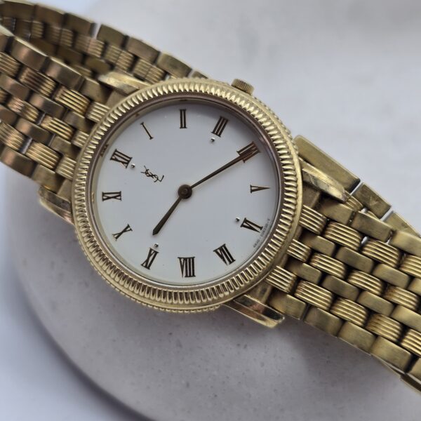 YSL – złoty zegarek vintage na bransolecie z rzymskimi indeksami, lata 90.