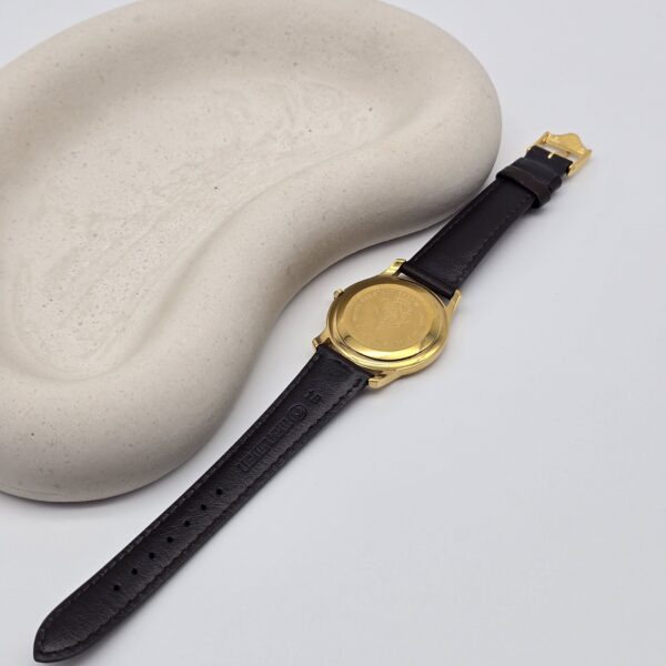 GUCCI - elegancki zegarek vintage z rzymskimi indeksami, lata 90. tył