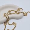CHANEL - naszyjnik vintage z ażurowymi medalionami CC, lata 90.