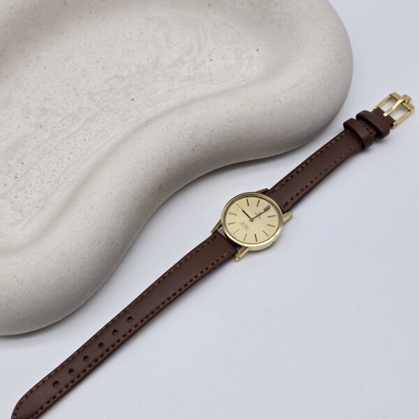 OMEGA – zegarek vintage złoty De Ville Quartz, lata 90. front