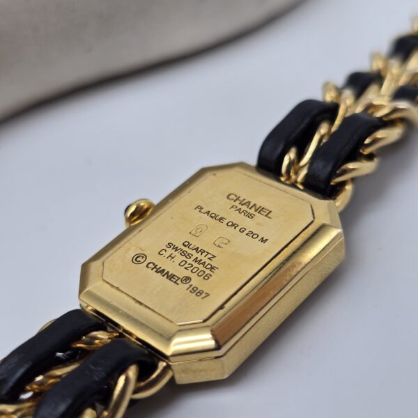 "CHANEL- model Chanel Première, lata 80." zbliżenie